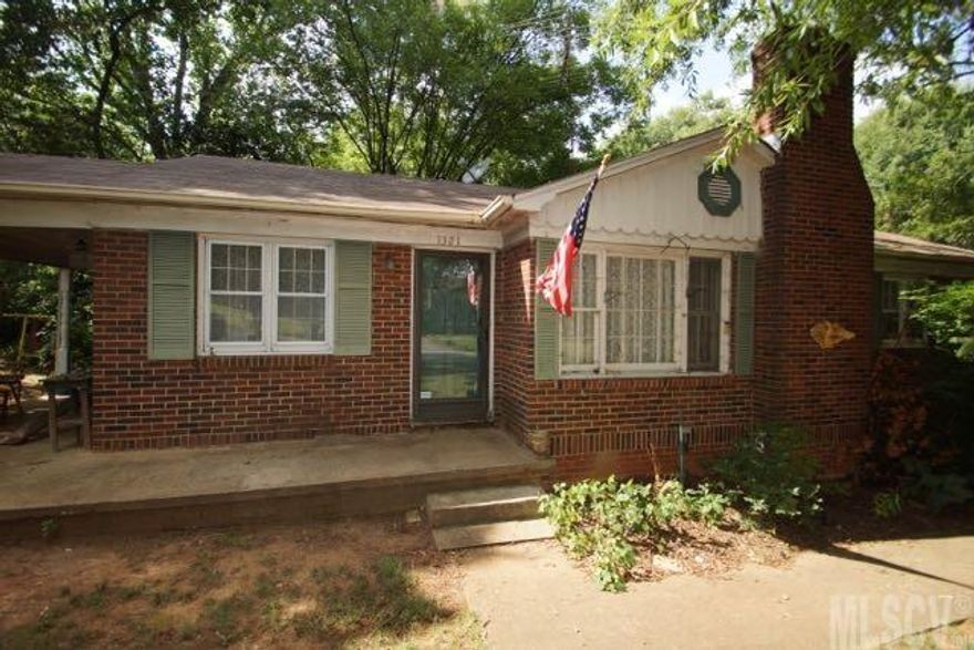 Affordable Brick three bedroom home with full basement. Large lot with Workshop and garden area.
