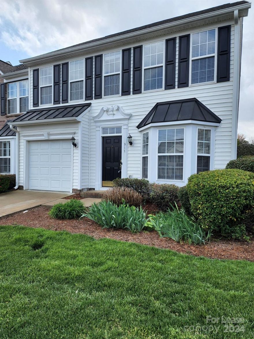 Lake Wylie Lifestyle will not disappoint.! Large End unit Townhome with excellent floor plan. Primary bedroom & laundry on the main floor. Enjoy making your chef creations in the kitchen with stainless steel appliances or relax in the great room by the gas log fireplace. Luxury Vinyl Plank through out entire house. NO CARPET. Brand new washer & dryer. Private fenced in backyard with patio & awning.  Community pool and playground. Just minutes from shopping, dining and medical & all that Lake Wylie has to offer for Summer Fun! Plus Clover School District’s award winning schools! Located between Rock Hill and Charlotte, Lake Wylie is one of South Carolina's premium communities. Convenient to Charlotte Douglass Airport. Easy access to Charlotte commute.