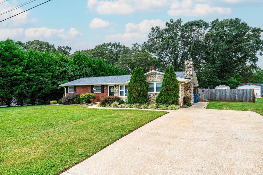 Welcome to this updated one-level ranch home located just off 29th Avenue in the Belle Meade neighborhood. With a brick and stone exterior and several interior improvements, this home is comfortable and easy to live in.

Inside, you'll find a cozy living room with a brick fireplace—great for relaxing. The kitchen has granite countertops and a large bar that's perfect for casual meals or hosting friends. It comes with a gas stovetop, microwave, oven, and dishwasher (note: refrigerator not included). The floors throughout are durable luxury vinyl plank.The former garage has been turned into a large primary bedroom with its own fireplace, making it a warm and inviting space. There are also two more good-sized bedrooms and a bonus room currently used as a walk-in closet and office.The bathroom features a tiled shower with a built-in bench and a modern vanity. All the windows have been replaced over time to improve energy efficiency and let in more natural light.

Outside, there’s a big, flat backyard that’s fully fenced—great for pets or kids. A storage building is included for tools or extra space.

Other features include: 
Spacious laundry room,
Quiet, well-established neighborhood
Close to shopping, schools, and parks

This home is a great fit for first-time buyers, anyone looking to downsize, or those who want easy one-level living in a convenient location.