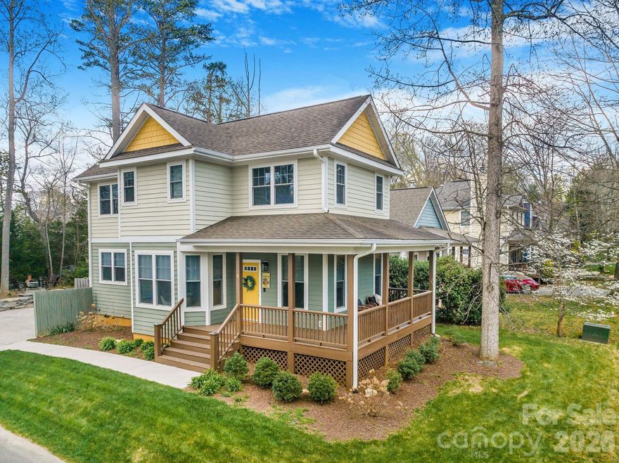 Exquisitely maintained Oakley neighborhood gem, offering all the conveniences of an Asheville address, with NO CITY TAXES! Perfectly sized for comfort, efficiency, and everyday living, this home is ideally located just steps from local favorites like Gladheart Farmers Market, Oakley Library, and Oakley Park, and only minutes to Biltmore Village, Mission Hospital & Downtown Asheville. Rumor has it that Oakley is also slated to get an All Day Darling cafe soon!

Certified Energy Star rated, featuring thermal windows, the home is designed for year-round efficiency with a dual-zoned HVAC system, including a new furnace (2021) and new A/C (2025), natural gas powered hot water heater.

Inside, you’ll find a tastefully updated kitchen with stone countertops, wine rack and cabinet fronted dishwasher. An open-concept floor plan is highlighted by arched passthroughs a cozy wood-burning fireplace, ample windows to bring in natural light adorned with custom fitted blinds. Hardwood floors throughout the main level plus three full bathrooms and plentiful closet space. The home truly shines outdoors, offering multiple inviting living spaces—a charming wrap-around covered front porch, lush grassy front yard, a private fenced courtyard-style patio just off the kitchen, and a flagstone patio tucked into a serene grove of trees. Professional rock work and landscaping elevate these outdoor areas, while a retaining wall and concrete parking pad added in 2023 provide ample off-street parking.

This home offers a rare combination of thoughtful updates, energy efficiency, and beautifully designed indoor and outdoor spaces, all in one of Asheville’s most convenient and connected neighborhoods.