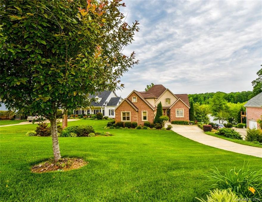 Lake Norman living so close to shopping, restaurants, doctors, I77, Hwy 150! Beautiful waterfront 4 bedroom brick home with 2nd living quarters.  Master on Main and Master on lower level walk out.   Updated kitchen with hardwoods on first floor. Almost all rooms have a view of the lake. Gorgeous ceramic tile on lower level. Large deck, professional landscaping, covered dock & gazebo. This home is a must see, immaculate, well cared for one owner home. Motivated sellers, great value! Must see!