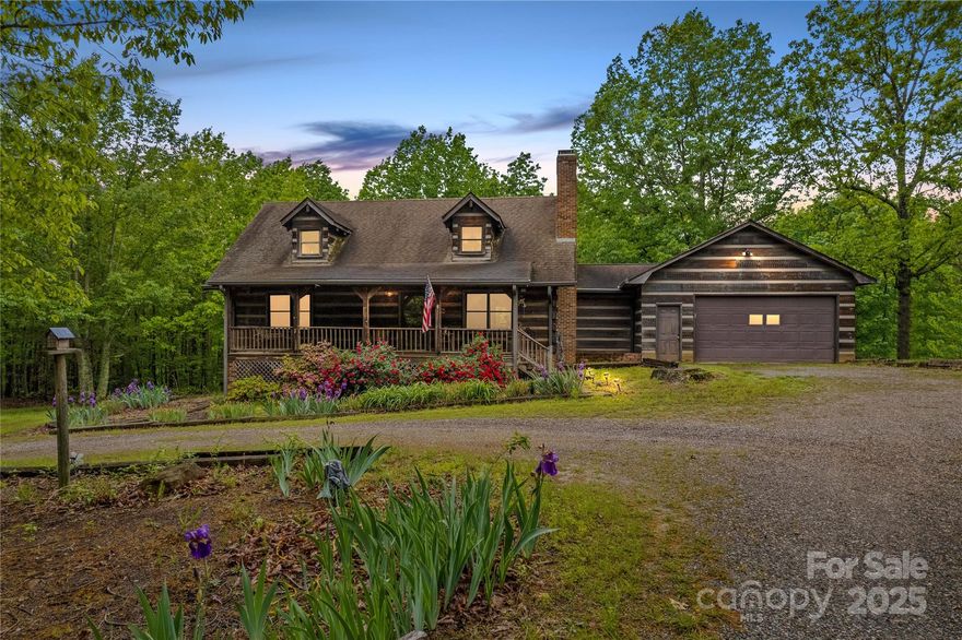 This property provides privacy galore. Home is located in the middle of a wooded 19 acres and offers 3 bedrooms and 2 full baths with a full, unfinished basement. You will love the beautiful wooden ceilings and walls and gleaming hardwood flooring. High vaulted ceilings create open and spacious living areas. Primary suite upstairs has jetted tub and separate walk-in shower. The huge back deck overlooks the private yard and is perfect for enjoying summer evenings and entertaining guests. Amazing location that is convenient to golf courses, award-winning schools and medial centers, and major interstates I-40 and I-77.