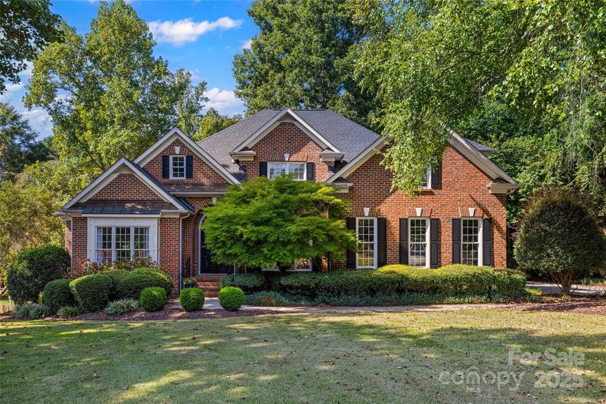 Welcome to this exquisite Meadow Lakes residence, where luxury and comfort converge. This stunning home has been meticulously updated and features a seamless, open floor plan with gleaming hardwood floors throughout. An abundance of windows bathes the entire home in natural light, creating a bright and inviting atmosphere.
The heart of the home is the recently remodeled, state-of-the-art kitchen, a chef's dream with a massive island, perfect for both meal prep and casual dining. The kitchen flows effortlessly into the spacious breakfast and dining areas. The great room offers a beautiful view of the backyard, complete with a cozy fireplace, built-ins, and elegant crown molding. The home also includes a formal dining and living room, perfect for entertaining. The main level is home to the serene primary suite, featuring a tray ceiling, a luxurious en-suite bathroom with an oversized dual vanity, walk-in shower, a garden tub, and a spacious walk-in closet. Upstairs, you'll find three additional bedrooms, two full bathrooms, and an expansive bonus room, providing ample space for family and guests.The best part of this home is the private .55 acre lot. The expansive grounds are perfect for entertaining and hosting large parties or get-togethers, A screened-in porch with its own wood burning fireplace offers the perfect retreat to unwind. Recent upgrades include new plumbing, HVAC duct work, vapor barrier, dehumidifier and a new roof. This exceptional property is located in a highly desirable community with a clubhouse, community pool, and tennis courts.