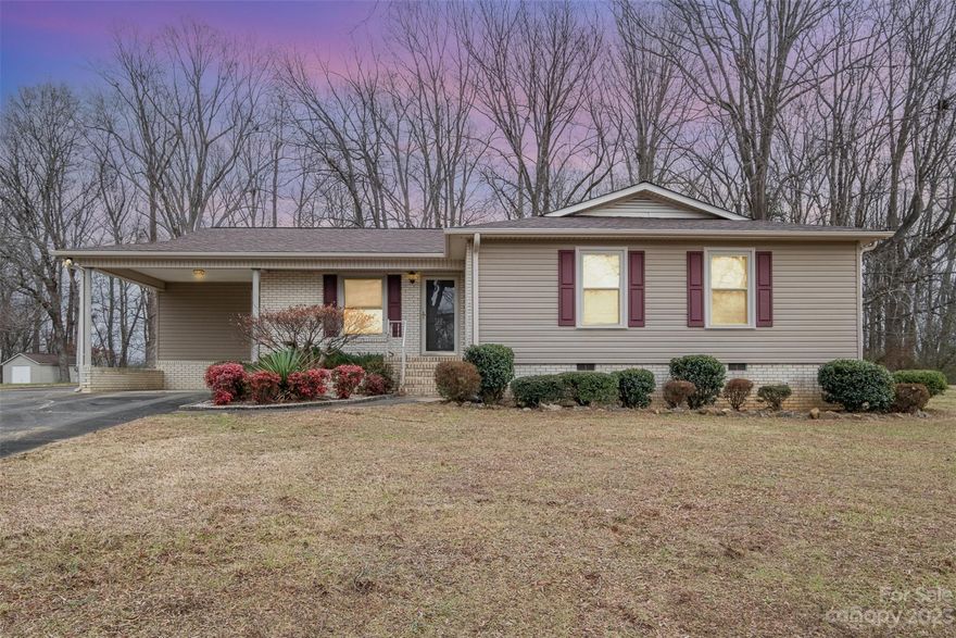 Here is your opportunity to live in the country on a 1.1 +/- acre lot and an additional 2.1 +/1 acre wooded lot included. You will have approximately 3.2 acres of total land. This is a well maintained home that will include a NEW ROOF and a NEW DISHWASHER. HVAC was installed in 2018 per the permit record. ALL personal property will convey with this sale. A wood burning Buck stove is installed in the fireplace. The carport side loads to the kitchen. A detached 2 car garage has workshop space and plenty of storage options.  Enjoy a morning coffee or entertain friends on the rear covered deck. There is a separate wooden structure located at the lower end of the second parcel that can be used for additional storage or possible animal sheltering. You can make this home into your own template but you should act very quickly as this type of property does not hit the market that often. Back on market as previous buyer changed mind and did not obtain an inspection.