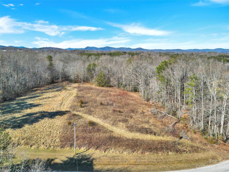 RARE 18+/- acres of beautiful timber other than approximately 2-3 acres. Can be subdivided depending on the use. Not commercial. Farming or residential only. Buyer can contact tax office to check into tax deferment opportunities for wooded land/forestry plan. Quiet living in a great central location! Only 10 minutes to I-77, 20 minutes 1-40, Quick drive to the mountains ~ 1 hour to Boone, 1 hour 15 min to Blowing Rock. 30 minutes and you're on the water of Lake Norman, 1 hour to Winston-Salem, 2 hours to Asheville, 15 minutes to Wilkes County. Easy drive to campgrounds, hiking, wineries.