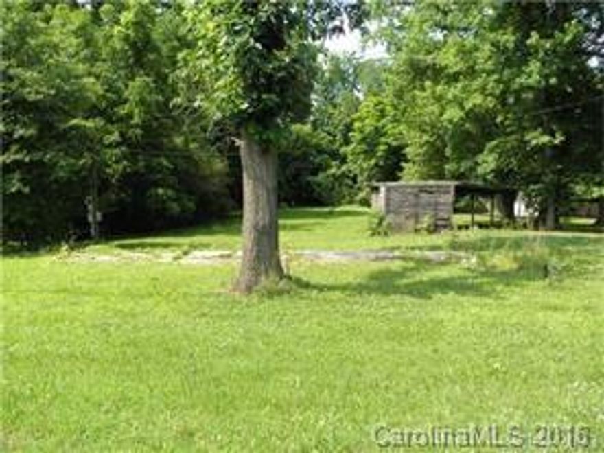 Nice builders lot in established community, a pad in place that may be usable, old outbuilding in place.
