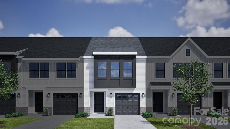 This two-story townhome includes three bedrooms and two-and-one-half bathrooms. Immediately inside the entrance, a hallway that leads past the staircase and half bathroom and into the open concept great room with an eat-in, kitchen, and patio. The primary suite features a walk-in closet, tray ceiling, and dual vanities. A laundry closet is located just outside of the primary suite for ultimate convenience. Two secondary bedrooms and one full bathroom are also located upstairs. A one-car garage and a bench and cubbies complete this floor plan.