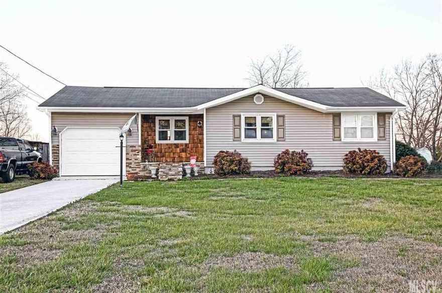 Beautiful 3 bed/ 1 bath, one-level living with spacious floor plan! Hardwoods with a custom design in the main living area. Dining area has french doors leading out to the backyard, with in-ground 20 X 40 pool, pool house with a full bathroom, a wired workshop. Pool area also boasts a covered patio complete with ceiling fan, lighting, outdoor sink, herb garden, and 3 large raised beds. Attached one-car garage, and cedar shanks on the front with finished landscape make this the perfect place to live!