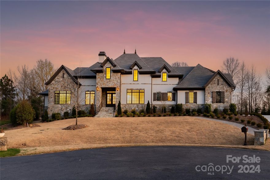 This Newly Built Luxurious Estate was Masterfully designed by the well-sought-after Architect Peter Brooks. This home exudes a presence of Elegance & Grand feel to it w/ high ceilings, detailed coffered & trey ceilings in nearly every room, advanced smart control technology, green energy efficiency, & the highest degree of rare stone & quartz countertops in all bathrooms, kitchen, & butler wet bars. The Chef's Kitchen has an elaborate display of Top Tier Chief Appliances surrounded by the large kitchen island. The owner’s suite, located on the east wing, has an attached private office custom trimmed w/ hidden door, massive walk in closet, & a master bathroom w/ 6 massage jets, & 2 rain heads controlled w/ Digital touch screens. The custom crafted home theater w/ 3 tiers, offers a full stage for live entertainment, Karaoke, 160’ screen, w/ 23 speakers engulfing you w/ sound from every direction. The Terracotta tile terrace & porch out back overlooks the custom pebble tech pool & spa!