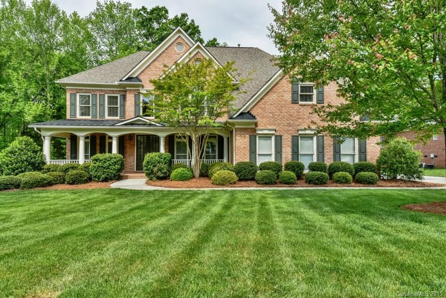 Expanded full brick Columbia located on level lot with wooded privacy at rear and adjacent lovely common area park. Property includes screened porch and oversized deck for enjoying the serene lot. Open plan w/SS KT, granite, gas cooktop, large desk and pantry. Convenient 5th ML BR is ideal for guests or home office. 3rd floor bonus is huge & features half BT (w/space for potential shower) and storage space. Excellent neighborhood amenities & well rated schools.