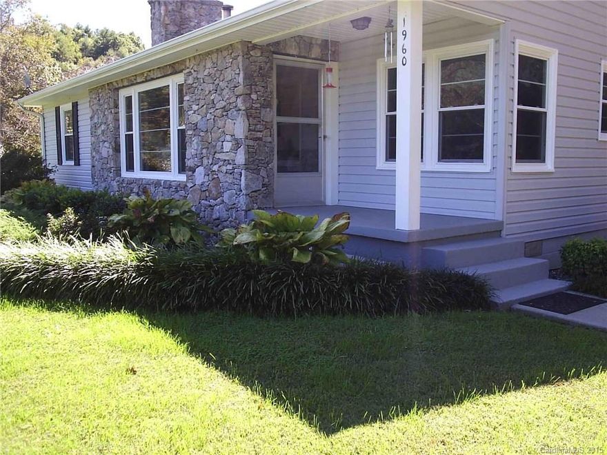 Very special find large tract with meticulously maintained home AND restorable old log cabin AND RV pad with 2nd septic system. 5 minutes from Mars Hill & 25 minutes to Asheville. This is a gorgeous, private rural setting. Updated home with custom kitchen with island, original hardwoods throughout main living areas & family room with fireplace. Large master suite has sitting room, walk-in closet & big master bath. Big laundry/mud room too. 16 x 20 deck overlooks private cove with fruit trees.