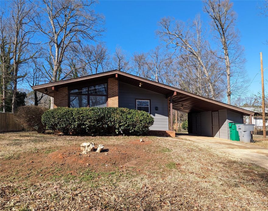 Unique and newly remodeled home just minutes away from the heart of Charlotte. This home has close access to Sugar Creek Rd, North Tryon, I-85, and countless places to shop, eat, and visit. The home features 3 spacious rooms, two full bathrooms, and a beautifully designed living room with a cathedral-style ceiling and large windows for rich natural lighting. The backyard is highlighted by its space, privacy, and outdoor lighting. With so much to offer, this is an opportunity you don't want to miss.