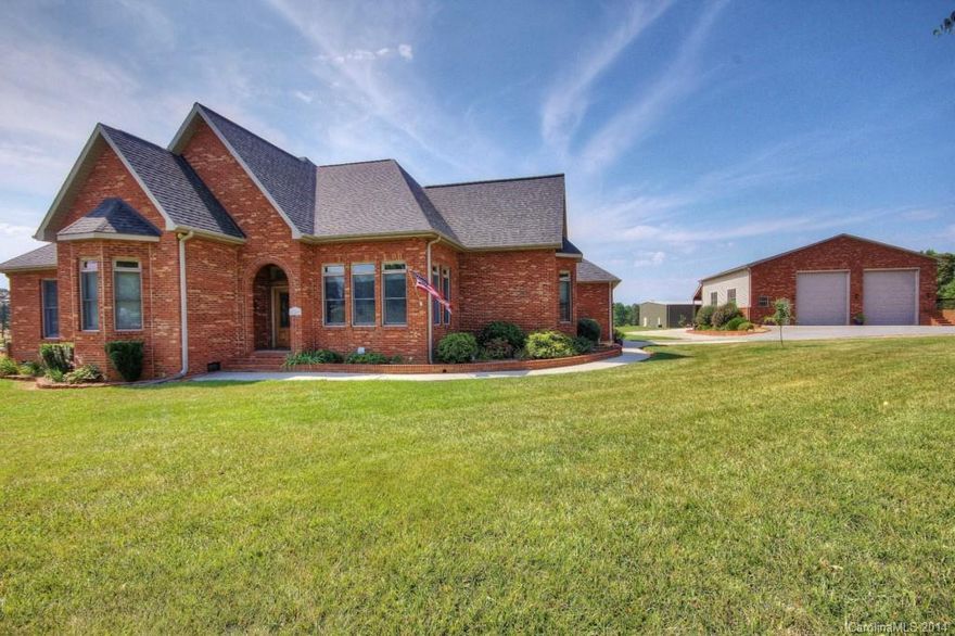 Car Enthusiast Dream!! Custom Full Brick Ranch with Massive 41 x 51 shop with 41 x 15 carport on the back that can house Cars or RV's, heated & cooled, 16 ft ceiling, tow 14 ft doors, 200 amp service, 220 plug, RV plug, 10,000 lbs lift, plus an additional detached 25 x 24 two car garage all on 2.5 acres. Incredible Shop...MUST SEE! Home is in great condition, ready for immediate occupancy. Backyard is fenced and pool ready! Beautiful level acreage, partially fenced, hardwood & tiled floors.