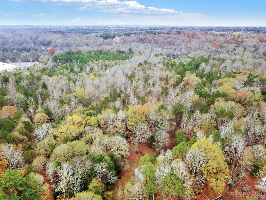 33 acres of land with a great location close to 160, 521, and Ballantyne! Endless opportunities for commerical or private development. The back of the property runs along Sugar Creek.