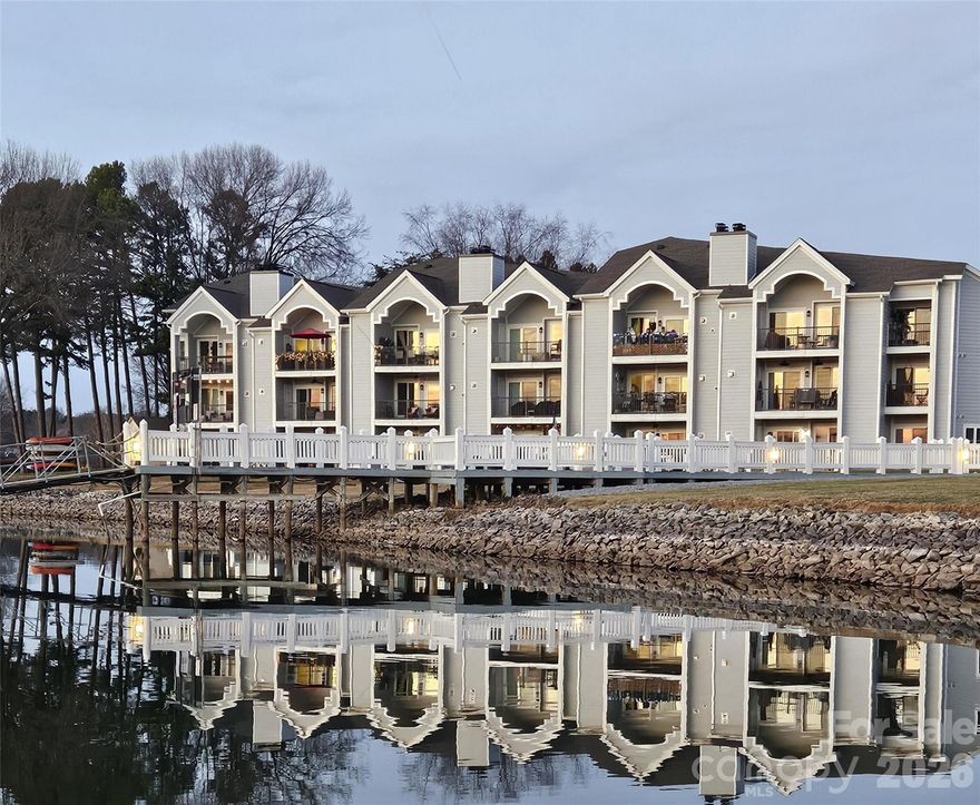 #1 LAKE VIEWS in sought after Admirals Quarters!  2BR/2BA 3rd floor = vaulted ceilings in FR and SPECTACULAR views of Lake Norman! Bamboo hardwood flooring throughout living area. Kitchen with granite, SS oven, fridge and DW new ‘23/’24. Laundry off kitchen with W/D new ‘23. Master BR w/closet, custom tiled step in shower! 2nd BR w/ large closet, built-in desk, Pella windows allow great breezes! 2nd bath w/tiled shower/tub combo, granite top vanity. New Pella sliders step out to your deck from FR AND MBR for amazing lake views! FR has a beautiful built-in Regency electric fireplace! HVAC 2020, water heater 2025. Exterior Hardy siding 2025. Amenities: pool, clubhouse, exs room, tennis/pickleball, kayak storage, beach, day docks. MUST SEE!