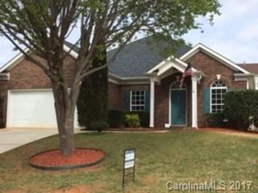 Hard to find ranch plan with 4 bedrooms and 2 full baths.  Completely renovated with new roof, flooring, carpet, paint, light fixtures, dishwasher, disposal and range/oven.  Open floor plan with kitchen island overlooking breakfast, family, built in desk and enormous patio.  Dining with decorative columns and display niche.  Front bedroom has French doors and can be home office.  Huge master suite with bay window, walk in closet, jetted tub, separate shower and large vanity area with dual sinks.