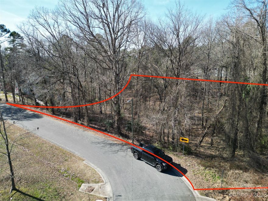 +/- 2.28 AC at 142 and 148 Paddington Dr SW. Very convenient access to Downtown Concord, US 601, and Hwy 49! Current zoning is RM-1 with a maximum of 3 dwelling units per acre. There is a slope at the street and back perimeter of the two parcels. Please note the sewer easement conveyed with the parcels. Survey and preliminary plat can be found in the photos. If subdivided into the proposed 4 lots, it won't need to wait for sewer allocation since it's less than 3 lot subdivision per original parcel.  Zoning allows for stick-built and modular homes. No manufactured homes allowed.