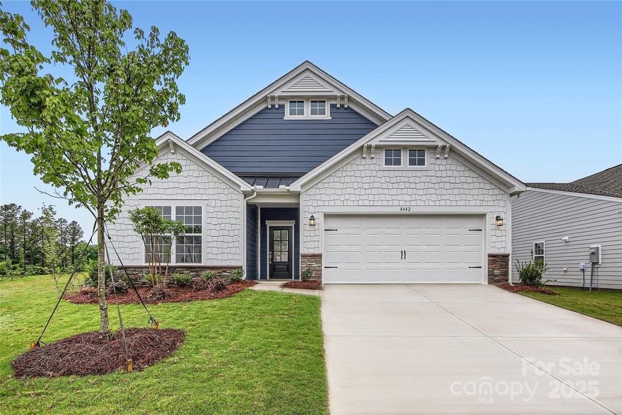 This new Bedford floorplan is a single-story home featuring an open-plan layout that flows seamlessly among the spacious family room, modern kitchen and sun-drenched breakfast room, which provides direct access to a covered patio. Flex space adds versatility. The owner’s suite and the secondary bedrooms are situated at opposite corners of the home for added privacy. Plus, our signature Everything's Included program means you will get a gourmet kitchen with double ovens and cooktop, quartz or granite kitchen countertops, subway tile backsplash, ceramic tile, luxury vinyl plank flooring throughout the home, and a gas fireplace (per plan). Roselyn is a master-planned community offering exclusive ranch homes designed for active adults. This community features an experienced lifestyle team and future resort-style amenities including a swimming pool, clubhouse, pickleball courts, fitness, tennis, bocce and multi-use trails connecting to the Carolina Thread Trail.