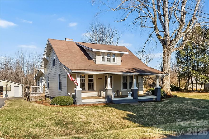 Looking for some land close to Morganton?  Look no further-this updated bungalow sits on 6.14 acres just outside the city limits.  Enjoy the cozy living room with gas log fireplace.  There are 2 bedrooms on the main floor, a separate dining room, kitchen, laundry and full bath.  Large back entry area with room for a desk.  Upper attic room is finished as a bedroom with large walk in closet.  Additional basement area leaves room for storage plus there is a detached garage and nice fire pit.  Side deck and covered front porch.  City water and septic.  Just minutes to downtown Morganton, shopping, restaurants and I-40.