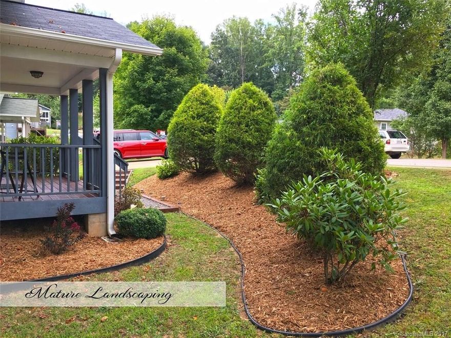 Pride of ownership at its finest! Home is move in condition! Semi-open floor plan with large dining area open to both kitchen & living maximizes this space. Fresh paint and clean spaces make this home a great one to view and there are not many like it in this price point! Three bedrooms in hall master has dual closets. Large hall bath and half bath for guests. Great sitting porch out front and ideal deck for grilling off kitchen/dining area. Privacy in the rear yard with mature landscape buffer.