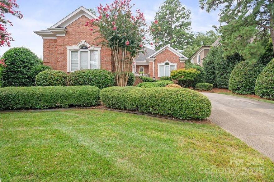 Rare find, full brick single -level living in the Peninsula!Across the street from Lake Norman in a community that you may join the  club, golf, sports courts, yacht club or pools for extra fees. Private lot fenced and privacy plantings all around. Addition of an EZ Breeze screened porch which makes for year round use or an airy patio. Oversized deep 2 car garage with tall ceilings great for storage, built in storage cabinets and 220 plug for your hybrid. Custom millwork, high end details and a spacious kitchen are a few of the outstanding features. Baths have been updated with primary having a large dual head Walk in  shower and new designer tub! Oversized laundry room has wet sink and cabinets for storage and a powder bath off the hall comingin from garage makes for a great guest spot.Fantastic location! Walk to Lake Norman and just minutes drive to 3 grocery store chains, restaurants and parks. Well maintained home, fireplace in the Great room there to greet you as you enter the home ! Great storage in the tall crawl space as well.  Seller is open to a lease purchase if your not sold yet! New Furnace installed 1/21/26!