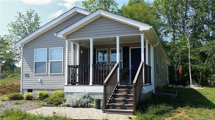 Move-in ready well-maintained 3br/2bath home with open floor plan and long-range mountain views. Great setting - lot is top of the culdesac with covered front porch and space to grow! Big master suite with double basins in bathroom, garden tub and separate shower. Spacious kitchen with eat-in island, ceramic back splash and Kenmore appliances. Laundry room off kitchen flows to private back/side yard - room for garden or shop. Storage shed for yard/hobby conveys. 15-20 minutes to downtown AVL.