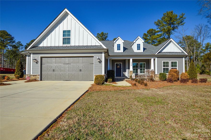 Welcome Home!! This newer ranch home boasts 4 bedrooms with 2 full baths and all the modern amenities you love! Enjoy time with friends and family in the spacious open floor plan concept featuring a spacious kitchen, dining area, and living room.  The kitchen is truly the heart of this home, with tons of storage, quartz countertops, a gas range, and an expansive island, perfect for entertaining. The home is full of modern amenities, including a tankless water heater, gorgeous lighting, LPV flooring throughout the entire home, soft-close cabinets and drawers, and ceiling fans throughout.  The main floor laundry room boasts a large pantry and a drop zone, perfect for dropping everything right by the garage door. The upstairs bedroom/bonus room has so many potential uses (office, mancave, guest bedroom, workout room, craft room, bonus room for the teenagers). Step onto your private, covered back porch, the perfect retreat to unwind. Your ideal blend of comfort and style awaits.