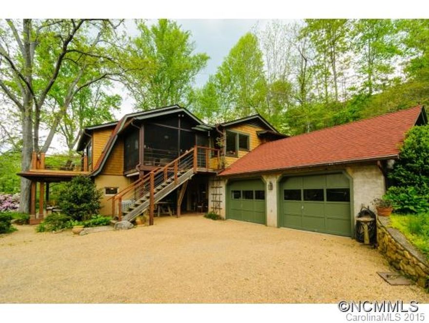 Enjoy the sunsets & year round views from this updated 2600 sf 3BR/2BA shingle bungalow on 1.4 gently sloping & open subdividable acres w/ giant shade trees, dogwoods & azaleas. A reverse floor plan maximizes views & privacy w/ kitchen, dining, living & master plus deck & screen porch all on the upper level. Just 5 mi from DT yet secluded at the end of a long prvt drive. 600 sf greenhouse - a plant lover's dream! Adjoining 0.4 Ac lot available.