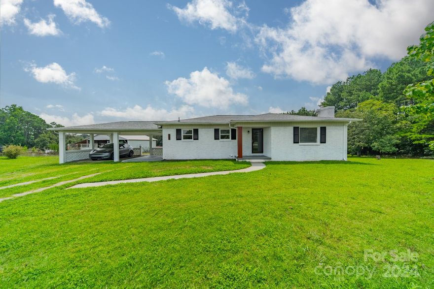 Explore this beautiful mid-century modern gem nestled on over two serene acres in a picturesque country setting near China Grove, Concord, and Kannapolis, just under an hour from Charlotte. The property features fresh paint, a basement, and abundant character, ready for your personal touch. Enjoy the tranquility of rural living while still being close to nearby amenities. Additionally, the outbuilding is set up with water and power, creating an ideal opportunity for starting a sustainable micro-farm, planting fruit trees, a vegetable garden, and flowers, and embracing an organic lifestyle.

The home is back on the market by no fault of the seller.  The buyer could not secure financing again, having nothing to do with the property