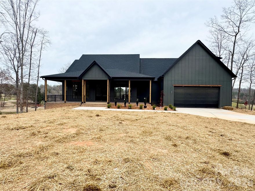 Welcome to this beautifully designed new construction home, offering the perfect blend of comfort, functionality, and breathtaking views. The thoughtfully crafted open floor plan creates an inviting and seamless flow between the living, dining, and kitchen areas, ideal for both everyday living and entertaining. The heart of the home features a spacious kitchen complete with a walk in pantry and a convenient wet bar area, providing ample storage and a perfect setup for hosting. Just off the garage, you will find a practical mud bench area designed to keep everything organized and tidy. The main level primary suite is a true retreat, showcasing incredible, unobstructed views of the stunning River Oaks Golf Course, perfect for enjoying peaceful mornings or unwinding at the end of the day. These same picturesque views can be enjoyed from the expansive covered back deck, offering an exceptional outdoor living space that is perfect for relaxing or entertaining guests. Upstairs, the finished room over the garage serves as a versatile bonus room complete with a closet, ideal for a home office, guest suite, playroom, or additional bedroom. With its desirable layout, thoughtful features, and unmatched golf course views, this home offers a rare opportunity to enjoy both luxury and lifestyle in a truly beautiful setting.