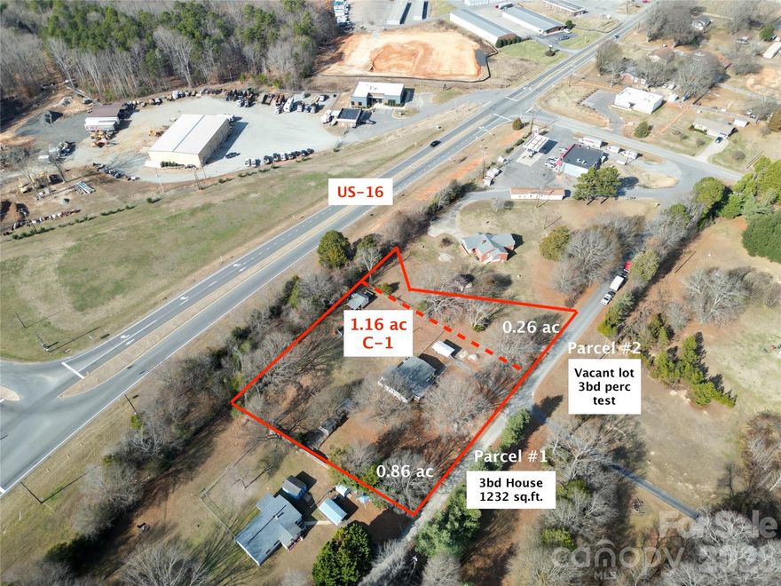 Seize this rare opportunity with a fully remodeled 3-bedroom, 2-bathroom manufactured home strategically located on a 1.12-acre lot along the busy US-16 Business corridor. The home has been completely renovated and inspected by a structural engineer to ensure it meets current code standards, offering peace of mind and modern comfort.

This property features impressive road frontage—215 feet along the main road and an additional 184 feet on Julius Mac Rd—providing excellent visibility and access. Positioned in the commercial heart of Stanley, NC, it is surrounded by established businesses including a gas station, storage facility, and construction company, enhancing its commercial appeal.

The true value lies in the C-1 zoned land, ideal for a variety of business uses. The offering includes two parcels, with the second parcel already perc-approved for a 3-bedroom conventional system, adding flexibility for future development.

A unique investment opportunity in a rapidly growing economic corridor.