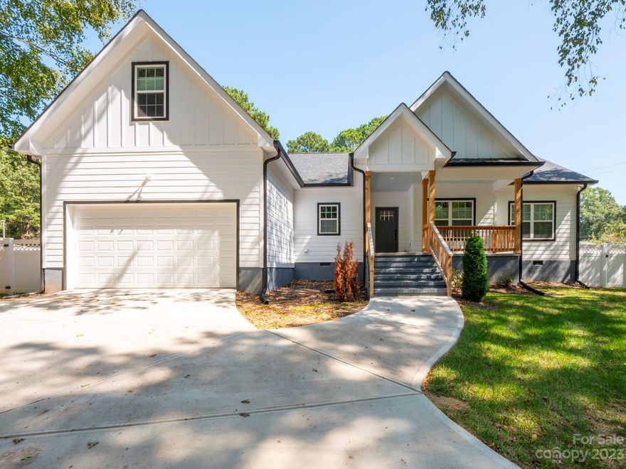 Custom 5 bedroom / 3 bath home built 2021 in Beautiful downtown Waxhaw. Excellent location close to shops and Restaurants.  Corner lot on .34 acres with mature trees.  Open floor plan kitchen/living room with natural lighting. Kitchen features island, Breakfast nook, walk in pantry.  Large primary Bedroom with ensuite.  Bonus room with closets and walk in attic space. Laundry/Mud room with Drop Zone.