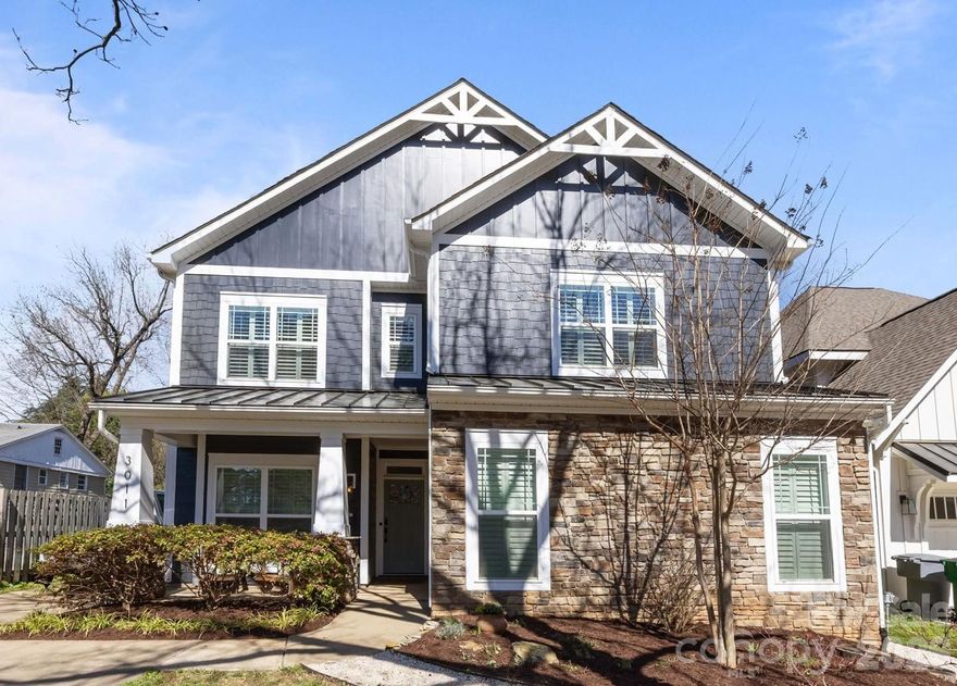 Welcome to this stunning 5 bed 4.5 bath home located in the heart of Charlotte’s highly sought-after Midwood neighborhood. This home balances modern luxury with everyday comfort, featuring an open floor plan. The welcoming entryway opens to the dining room, which leads to the spacious kitchen with white painted cabinetry, quartz countertops, and stainless steel appliances. An oversized center island provides the perfect spot for entertaining. The living room features a built-in bar and a cozy flex space, ideal for a reading corner or a breakfast room.  The main level offers a dedicated enclosed office and a guest suite or second primary bedroom with en suite bath. 
Upstairs, the primary suite serves as a private oasis, highlighted by a walk-in closet designed by California Closets in 2025. The spa-like primary bathroom features two vanities, a large soaking tub, and walk-in shower. Each of the secondary bedrooms is generously sized, and each bathroom is beautifully finished, ensuring comfort for family and guests alike. 
Outdoor living is a highlight of this property, providing multiple spaces to relax and entertain. Enjoy the fresh air from the three-season porch with room for lounging and dining, or enclose the porch with windows designed and installed by Valverax. Walk out to the spacious deck and the designated fire pit area. The backyard also features a greenhouse, raised garden bed, and storage shed. Low-maintenance native plant landscaping along with irrigation, makes yardwork a breeze.  The three-car garage, with storage area above, is a rare and valuable find equipped with a Tesla charging station. Home includes a tankless water heater and a whole water filtration system.  This home offers the perfect blend of sophisticated design and Midwood charm.