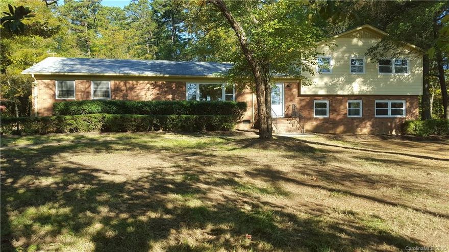 Meticulous restoration by detailed owner who was planning on moving in but has to move out of town! All new kitchen w/stainless appliances, downstairs master suite just added with 2 large walk-in closets and amazing master bath with "million dollar house shower" dual rainfall showerheads AND dual hand showers, giant tub.  Wide open floorplan, modern fixtures throughout. New GEOTHERMAL heating system. 1.5 acre +/- private lot less than 5 minutes from 485, 77, & 85. OWNER FINANCING AVAILABLE!