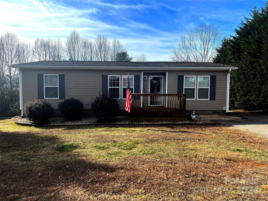 You will not want to miss out on this very well maintained manufactured home! This home features 3 bedrooms and 2 baths, living room, dining area and laundry room.  Home sits on an approximate 1/2 acre lot and comes with an additional almost 1/2 acre private lot with a fenced in area perfect for your 4 legged family members. Large back deck is perfect for grilling and entertaining guests. Paved driveway perfect for keeping your vehicles clean and a small outbuilding for your storage needs. Don't wait, schedule your showing today!