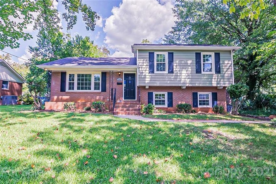 This Charlotte two-story home offers granite countertops.