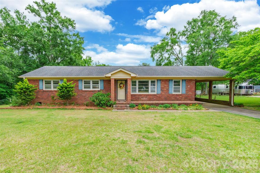 Enjoy the perfect blend of space and country charm with this 3-bedroom, 1.5-bath home set on 3.51 acres. This property offers room to spread out, relax, and enjoy the outdoors.

The home features a covered back porch—ideal for unwinding while taking in the peaceful surroundings. A fenced backyard adds convenience for pets or play, while the spring-fed pond enhances the property’s natural beauty.

Additional highlights include an attached carport and a wired storage building, perfect for a workshop, hobbies, or extra storage. With acreage, functional features, and serene setting, this property offers endless possibilities!
