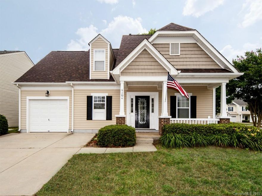 Charming 1.5 story home w/Master Bedroom & en suite bath downstairs. Updated w/all new bamboo flooring on entire first floor, spacious bedrooms upstairs separated by loft space overlooking the 1.5 story great room featuring surround sound. Kitchen is updated with stainless steel appliances. This home includes all appliances - washer & dryer too! Outdoor terrace is covered & wired for tv, backyard is private, fenced, & has raised beds for planting. New Roof in '14. Great community features!