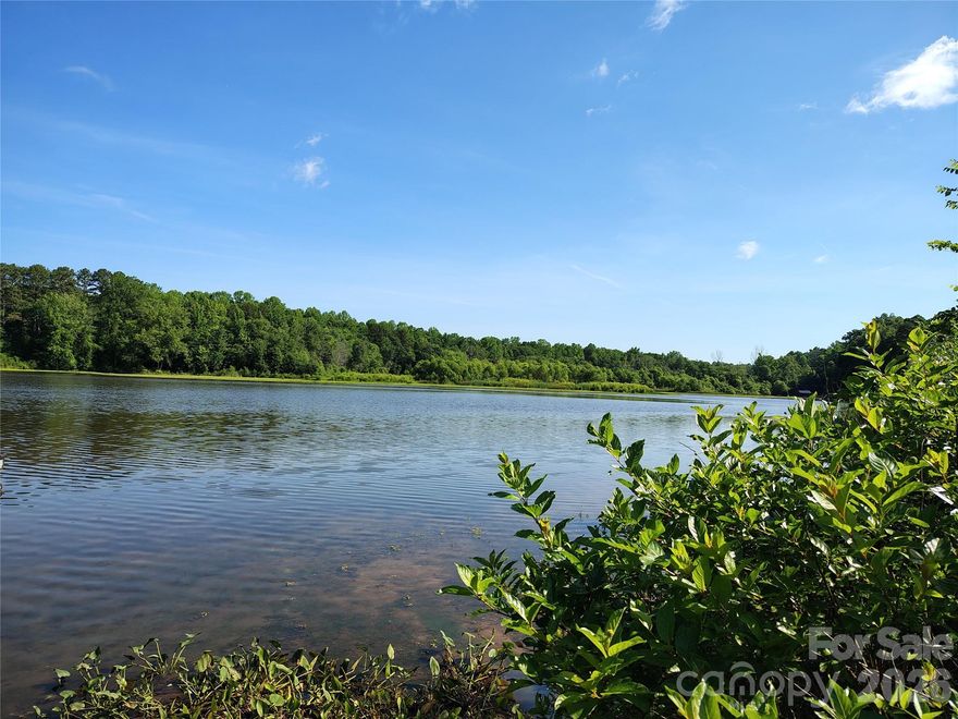 Almost a half-acre of waterfront land on Mountain Island Lake! Property contains a small, burned down house and other structures that will need to be cleared before building. Adjacent wooded lot (6385 Glenn Teague Road) also for sale, which totals almost a full acre of peaceful waterfront living.