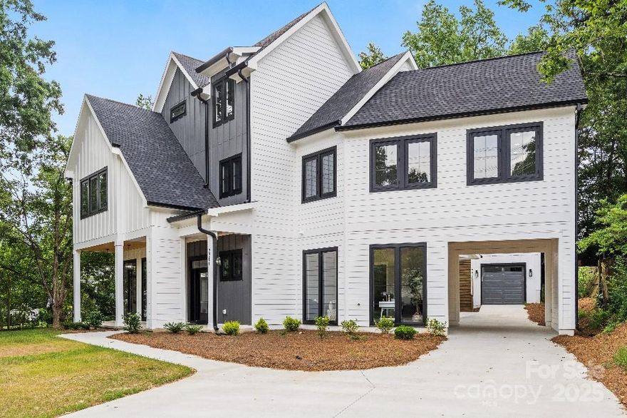 This home is a MUST-SEE! Nestled in a peaceful, tree-lined setting just minutes from Uptown Charlotte, this stunning three-story home perfectly blends timeless elegance with modern luxury. From the moment you arrive, you’ll be captivated by the home’s exceptional curb appeal, welcoming front porch, and meticulous landscaping.

High ceilings, designer finishes, and LVP hardwood floors flow throughout, adding a touch of sophistication to every room.

The gourmet kitchen is a chef’s dream-featuring premium stainless steel appliances, a large center island, quartz countertops, custom cabinetry, and a walk-in pantry-perfect for entertaining or quiet dinners. 

Don't miss the mother-in -law suite that could also be used as an income property.