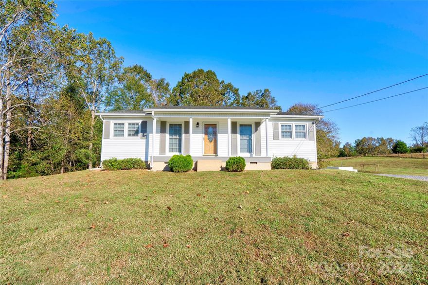 KINGS MOUNTAIN - 3 Bedroom 1 Bath home situated on a sprawling 3.62 acres. Rocking chair covered front porch. Beautiful hardwoods in main living spaces, tile in kitchen & bathroom, carpet in bedrooms. All kitchen appliances will remain. Detached garage with electricity and two lean-to's. There is another storage building with a roll-up garage door and an open shed behind home. Very well-maintained home in the Oak Grove Community. Close proximity to HWY 74 & I-85 making it an easy commute to larger surrounding cities. SHOWINGS BEGING MONDAY, OCTOBER 28th at 12PM! Schedule your tour today!