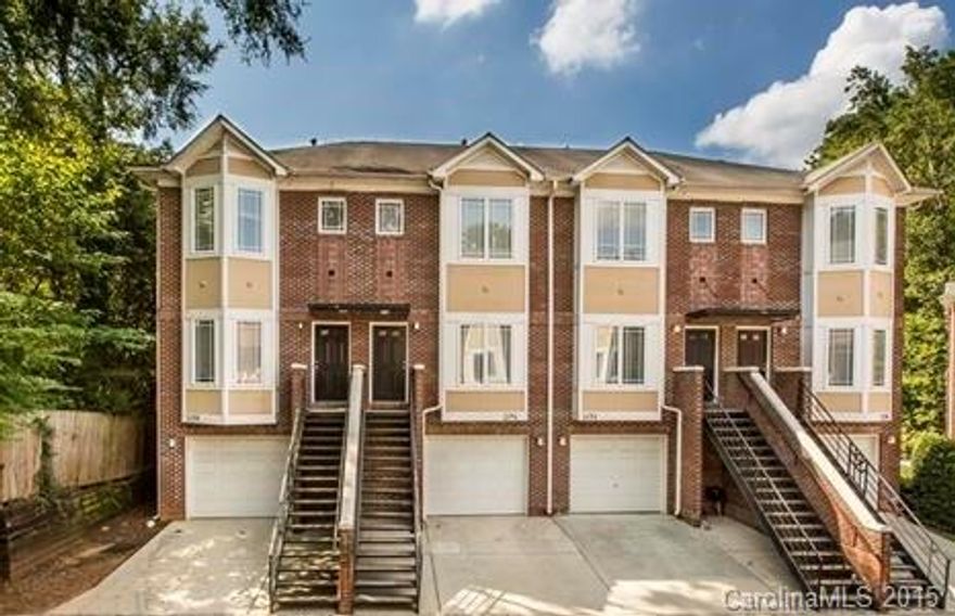 DON'T MISS OUT ON THIS FABULOUS LOCATION!  This highly desirable end unit has everything you could want! This open floor plan has hardwood floors throughout, granite countertops, stainless steel appliances & ceramic tile! The upstairs has a large master suite & an additional bedroom & bath! The lower level is perfect as a 3rd bedroom or office w/ full bath and opens to the most relaxing patio backing up to wooded area! Just minutes to Uptown, Southpark, airport & much more including light rail!