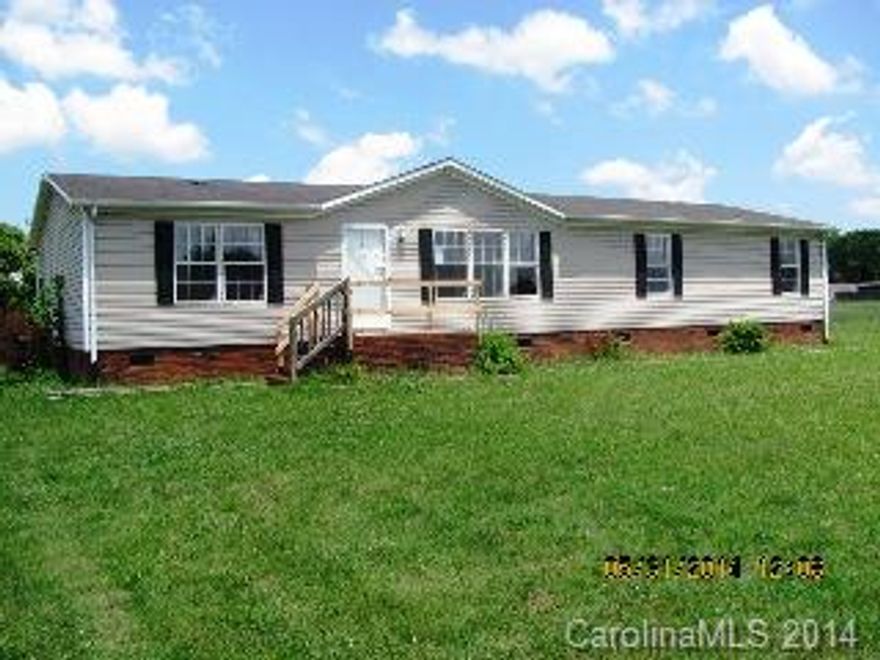 Four bedroom/two bath doublewide on an acre of land in a rural setting in Harmony. Open floor plan with family room and living room. Spacious master suite. Deck in back to enjoy your southern evenings. Equal Housing Opportunity. Sold as is. Seller makes no repairs. HUD, its agents and/or assigns make no representation as to the existence of mold, radon, or lead-based paint and is not liable for the potentially harmful effects thereof.