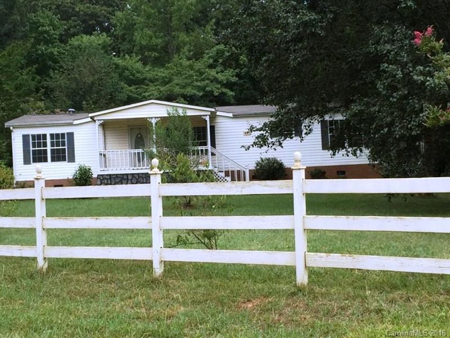 Private setting on large wooded lot. Large detached building. 2 Car carport with attached shed/ shop. FHA case #381 - 771477. Property is owned by the US Dept of HUD. HUD homes are sold in "as is" condition. Seller makes no representation or warranties as to the property condition. FHA Financing code is I and subject to appraisal. Seller may contribute up to 3% for buyer’s closing costs upon buyer request. HUD and this listing firm abide by all Fair Housing and Equal Opportunity policies.