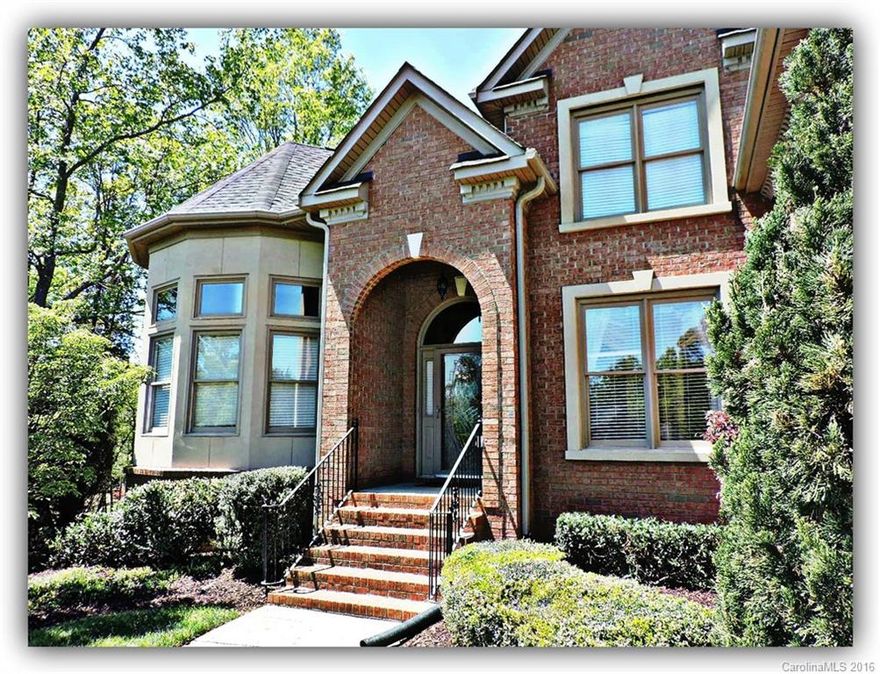 Stunning custom home with amazing attention to detail on .92 acre lot. Too many custom details to list. Highlights include chef's kitchen with stunning granite CT including an island & serving bar, 4 pantries. Extensive heavy moldings throughout. Gleaming wood flooring on main. Dual stairs. 2 Fireplaces. Turret LR w/ floor to ceiling windows, DR w/ custom built ins. Oversized owner’s suite w/ dbl TC & luxurious bath w/ CA style WIC, outdoor retreat water fall/pond, screen porch & much more...