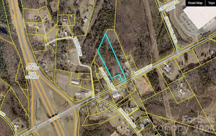 ±4.7-acre General Business zoned development site located along Maiden Highway in Lincolnton, NC, just minutes from the Hwy 321 interchange. The property offers strong visibility, access, and proximity to residential and industrial growth corridors.

Offered at approximately $122,000 per acre, the site presents an attractive entry point for developers seeking commercial land within the Charlotte MSA growth path.

The property is well-suited for self-storage (non-climate or hybrid), flex industrial, contractor yard, or service-based uses that can accommodate septic systems. With limited modern storage inventory directly along this corridor, the site offers strong long-term development potential.

Some of the existing structures provide opportunity for adaptive reuse or cost-effective site preparation, depending on development strategy. Priced to reflect utility considerations while offering strong upside for the right development strategy.