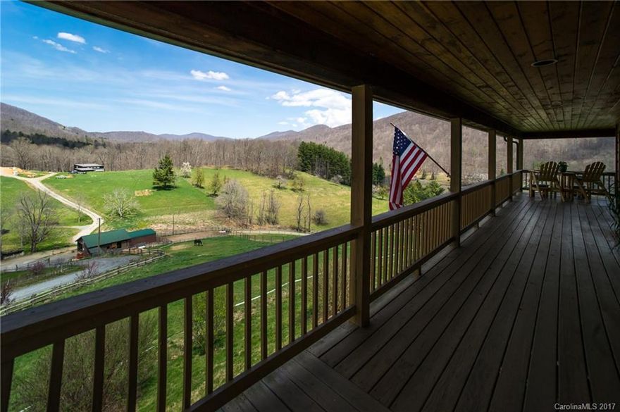 J & K Rocking Horse Stables, 5+ acres of scenic mountain VIEWS, 1200 sq ft heated garage w/washer for horse blankets, 3 stall barn w/matting, stall windows, commercial electricity & safety electrical outlets w/water heaters, 20 x 40 run in building attached, w/sand paddock, goat house, chicken coop, split rail fencing. Power gate system. Home overlooks barn with pastures front and side.  A Mountain Paradise.  Home open, rustic & inviting w/wrap-around porch w/panoramic breathtaking visas.