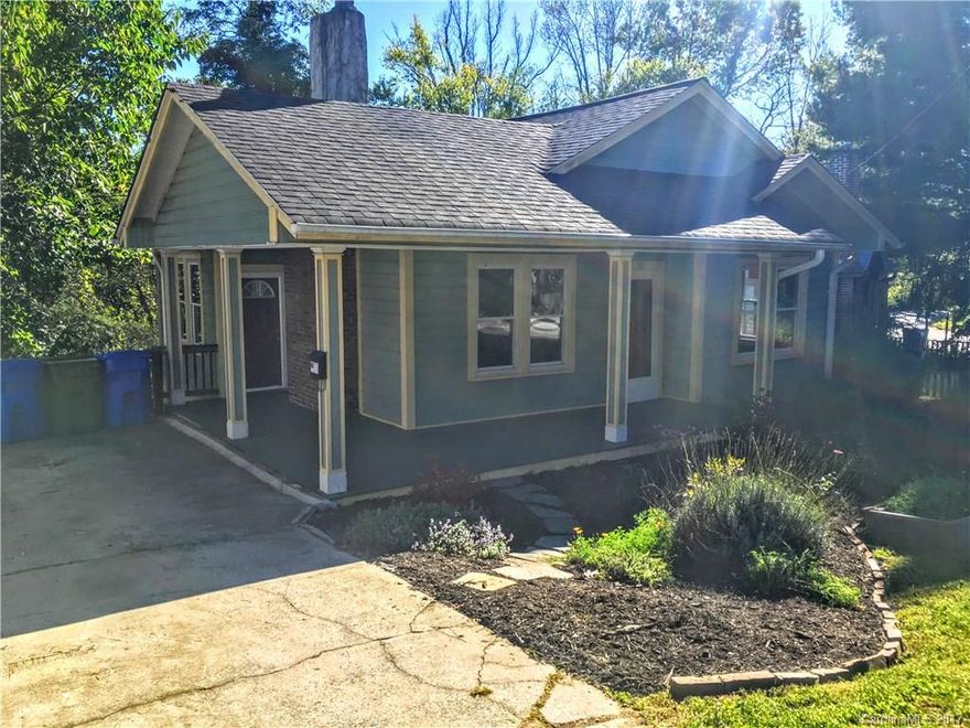 This charming 1920's bungalow has been renovated with all new plumbing, HVAC, electrical, roof, and exterior insulation! Relax in a rocking chair on the front porch with a garden view, or take a stroll downtown, this place has it all. Nestled in a quiet pocket of Montford, this home is move in ready. The lower level is equipped with all the utilities ready to make it a great rental unit, or guest quarters. Enjoy the peace and quiet of Montford, with the entertainment of downtown!