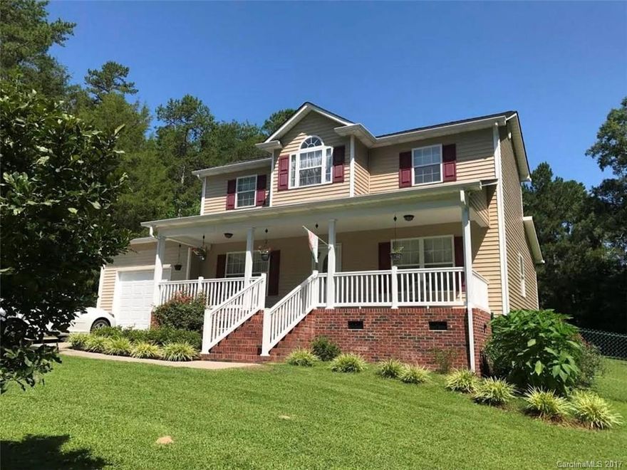 Don't miss out on this one; reduced to sell! Features include finished attached garage that is heated and cooled from home's central HVAC plus window unit, country front porch, deck on rear, detached storage and crawlspace that has air sterilization system for the home. All appliances remain (dishwasher never been used), bay window at dining area, half bath in laundry area, open media area at top of stairs and termite bond.