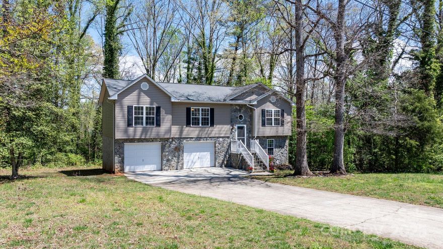 SELLER OFFERING $2,500 TOWARDS RATE BUY-DOWN OR CLOSING COSTS!! Step into this charming split-level home with a basement—a true gem blending comfort, character, and modern updates. Freshly painted and featuring gleaming hardwood floors, every room radiates warmth and style. The updated kitchen boasts refreshed white shaker cabinets and stainless steel appliances—perfect for your culinary creations. Enjoy three spacious bedrooms with generous closets, plus two large bathrooms that make busy mornings a breeze. The partially finished basement offers endless possibilities—use it as a bedroom, office, or entertainment space. With a flexible layout, this home adapts to your lifestyle. Ideally located near Catawba Meadows Park and Beanstalk Ziplines, outdoor adventure and green spaces are close by. Combining timeless appeal with modern touches, this home is ready for you to make it your own. Schedule your showing today!